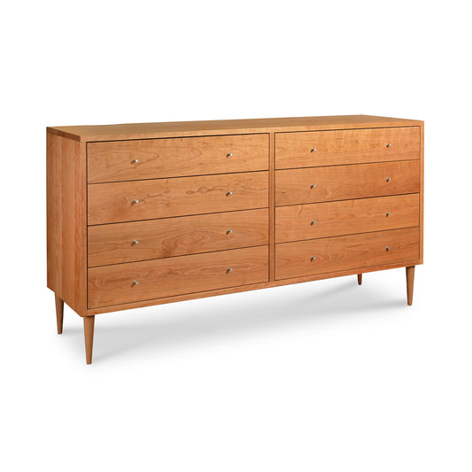 Larssen 8-Drawer Dresser by Vermont Furniture Designs, featuring mid-century modern style with sleek handles and tapered legs.
