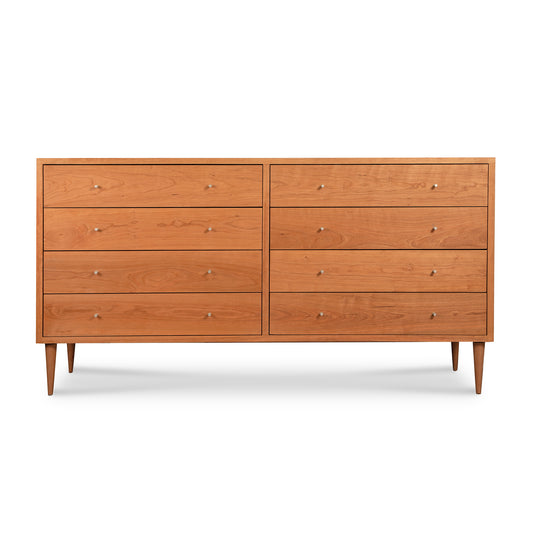 Larssen 8-Drawer Dresser by Vermont Furniture Designs in solid wood with a light finish, showcasing Mid-century modern style.