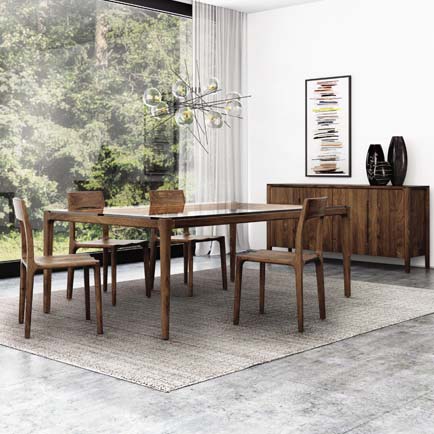 A modern dining room with a wooden table and chairs.