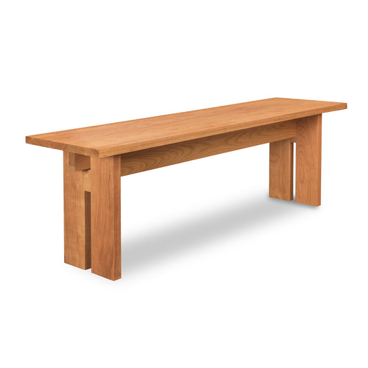 Modern American Bench by Vermont Furniture Designs showcasing a minimalist wooden construction with a flat seat, rectangular legs, and eco-friendly oil finish.