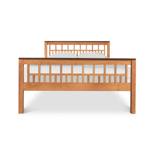 Trellis Bed in geometric pattern, crafted from solid hardwood with eco-friendly finish, featuring a white mattress.