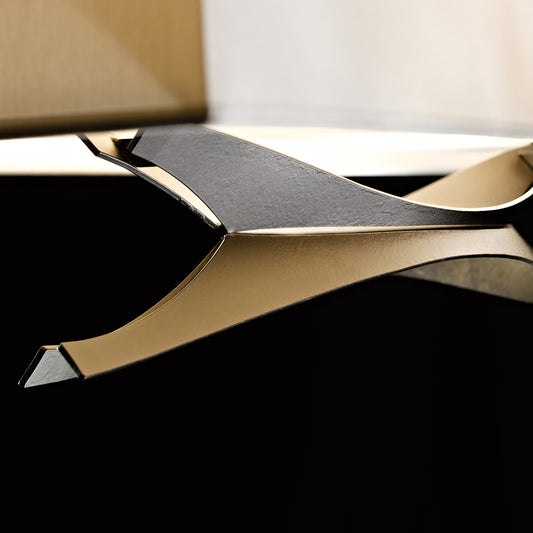 Moreau Pendant by Hubbardton Forge with angular metallic base and elegant shade, highlighting the light fixture’s craftsmanship.