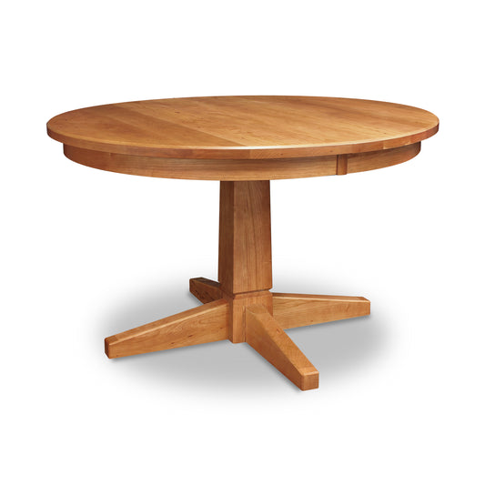 Lyndon Furniture Natural Vermont Single Pedestal Round Solid Top Table, handcrafted from solid wood with a smooth finish and elegant pedestal base.