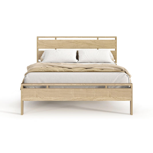 Copeland Oslo Platform Bed with solid oak frame and slatted headboard, showcasing modern craftsmanship and design.