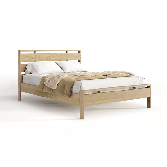 Oslo Platform Bed by Copeland Furniture with a modern slatted headboard, shown with simple bedding to highlight the bed’s sleek design and natural wood craftsmanship.