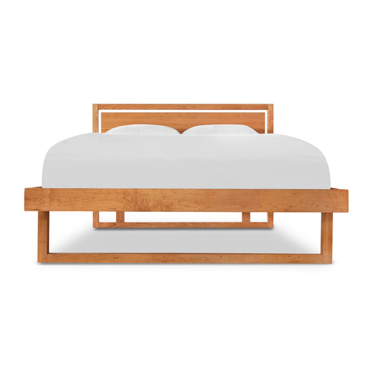 Modern Pendant Bed by Vermont Furniture Designs in sustainable wood with white bedding.