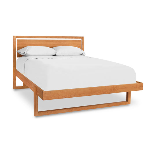 Pendant Bed by Vermont Furniture Designs featuring a wooden frame with a modern headboard and eco-friendly finish.