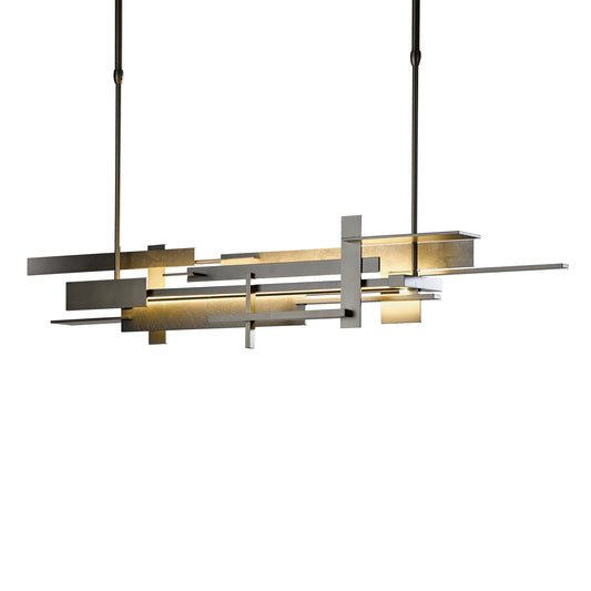 Modern chandelier with overlapping black and gold metal panels crafted by Hubbardton Forge, featuring intricate handcrafted lighting elements.