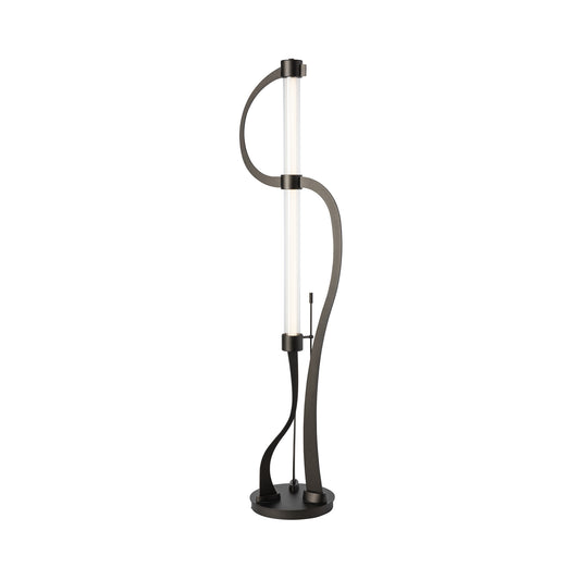 Pulse Floor Lamp by Hubbardton Forge, featuring a modern curvy dark metal frame and an LED tube on a round base.