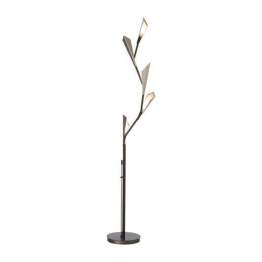 Modern Hubbardton Forge Quill Torchiere floor lamp featuring three angular LED lights on a sleek black metal stand with a round base.