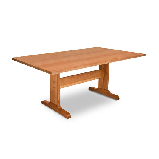 Lyndon Furniture Rectangular Trestle Solid Top Table crafted from sustainable wood, highlighting its sturdy trestle base and smooth finish.