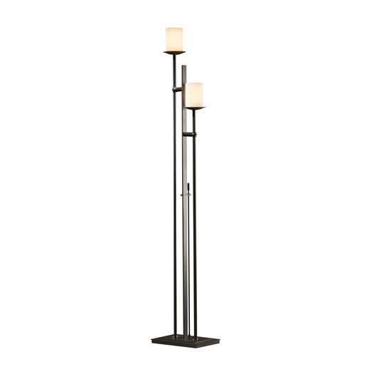 Hubbardton Forge Rook Twin Floor Lamp, black handcrafted design with cream cylindrical shades and a sleek rectangular base.