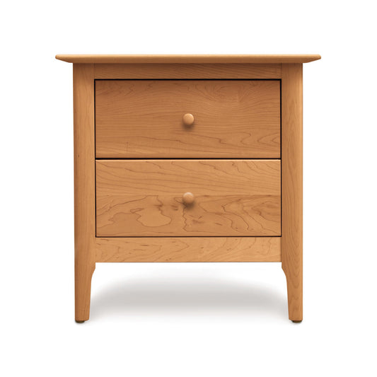 Sarah 2-Drawer Nightstand by Copeland Furniture with Shaker-style design, round knobs, eco-friendly wood, tapered legs, and light brown finish.