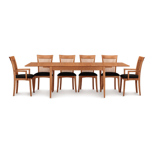 Sarah Shaker Tapered Leg Extension Table by Copeland Furniture with six black-cushioned chairs, showcasing elegant craftsmanship and modern design.