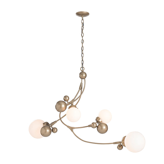 Modern Hubbardton Forge Sprig Pendant featuring an asymmetrical brass design with frosted glass globes.