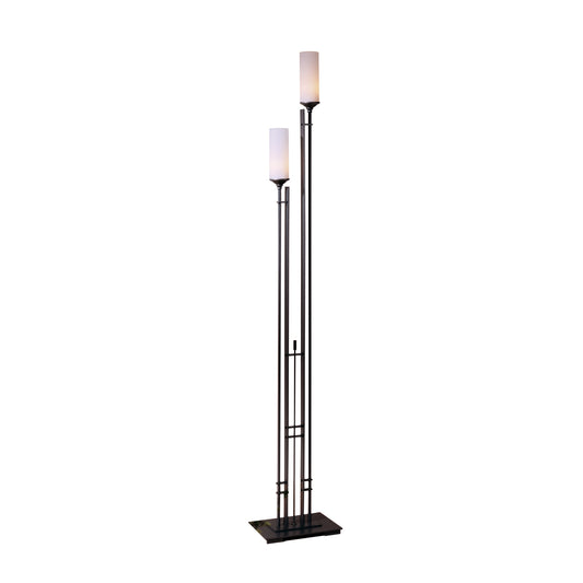 Tall Metra Twin Floor Lamp with black metal frame and white lampshades, crafted by Hubbardton Forge in Vermont.