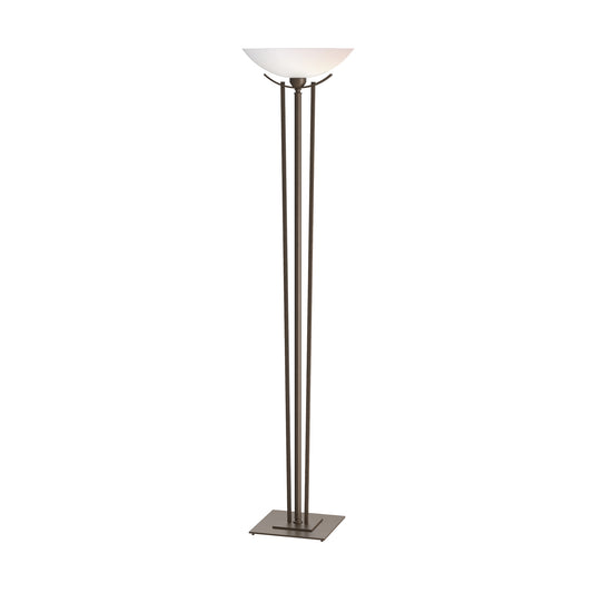 Hubbardton Forge Taper Torchiere floor lamp with a white bowl shade, three slender metal poles, and a square base, showcasing elegant American-made craftsmanship.