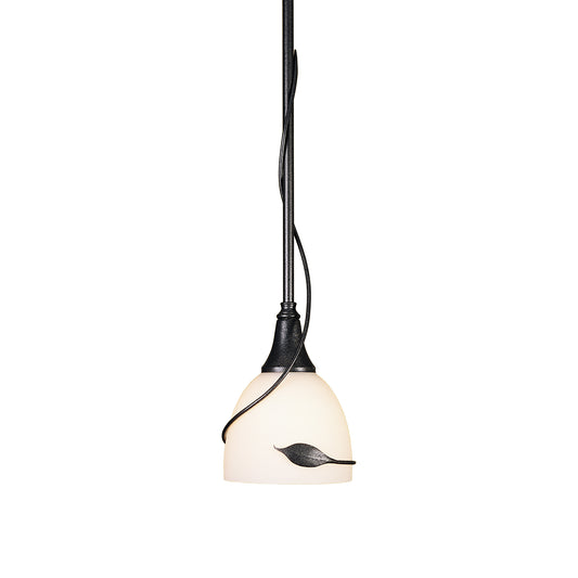 Twining Leaf Mini Pendant with frosted glass shade and dark metal leaf motif from Hubbardton Forge.