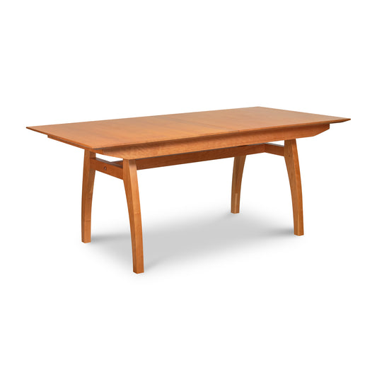Vermont Modern Butterfly Extension Table by Lyndon Furniture with rectangular natural wood finish and center extension leaf, showcasing sleek craftsmanship.
