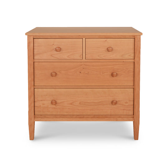 Vermont Shaker 4-Drawer Chest by Maple Corner Woodworks in solid cherry wood showcasing classic craftsmanship with two smaller top drawers and two larger bottom drawers.