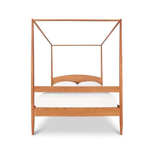 Vermont Shaker Four Poster Bed with Canopy by Maple Corner Woodworks, featuring white bedding and showcasing a timeless design.