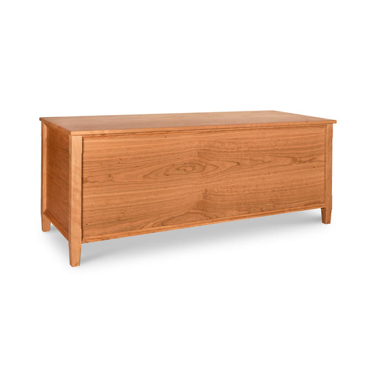 Vermont Shaker Blanket Chest by Maple Corner Woodworks made from sustainably harvested wood, featuring a smooth finish and simple design with closed lid and sturdy legs.