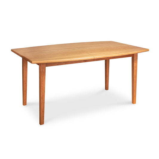 Vermont Shaker Boat Top Extension Dining Table by Maple Corner Woodworks, featuring a solid wood rectangular top with extensions and four straight legs in classic Vermont Shaker style.