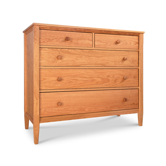 Vermont Shaker Extra Wide Chest by Maple Corner Woodworks in natural cherry wood with five drawers and round knobs.