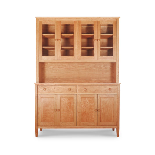 Vermont Shaker Large China Cabinet by Maple Corner Woodworks, handcrafted in hardwood with glass-paneled upper cabinets, two drawers, and lower wooden doors in a rich natural cherry finish.